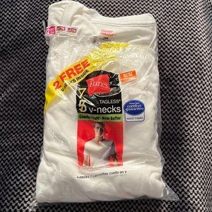 5 Hanes White V-neck T-shirts. New in the package.